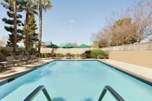 Outdoor pool, open 8:00 AM to 10:00 PM, pool umbrellas, pool loungers