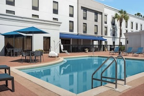 Outdoor pool, pool umbrellas, sun loungers