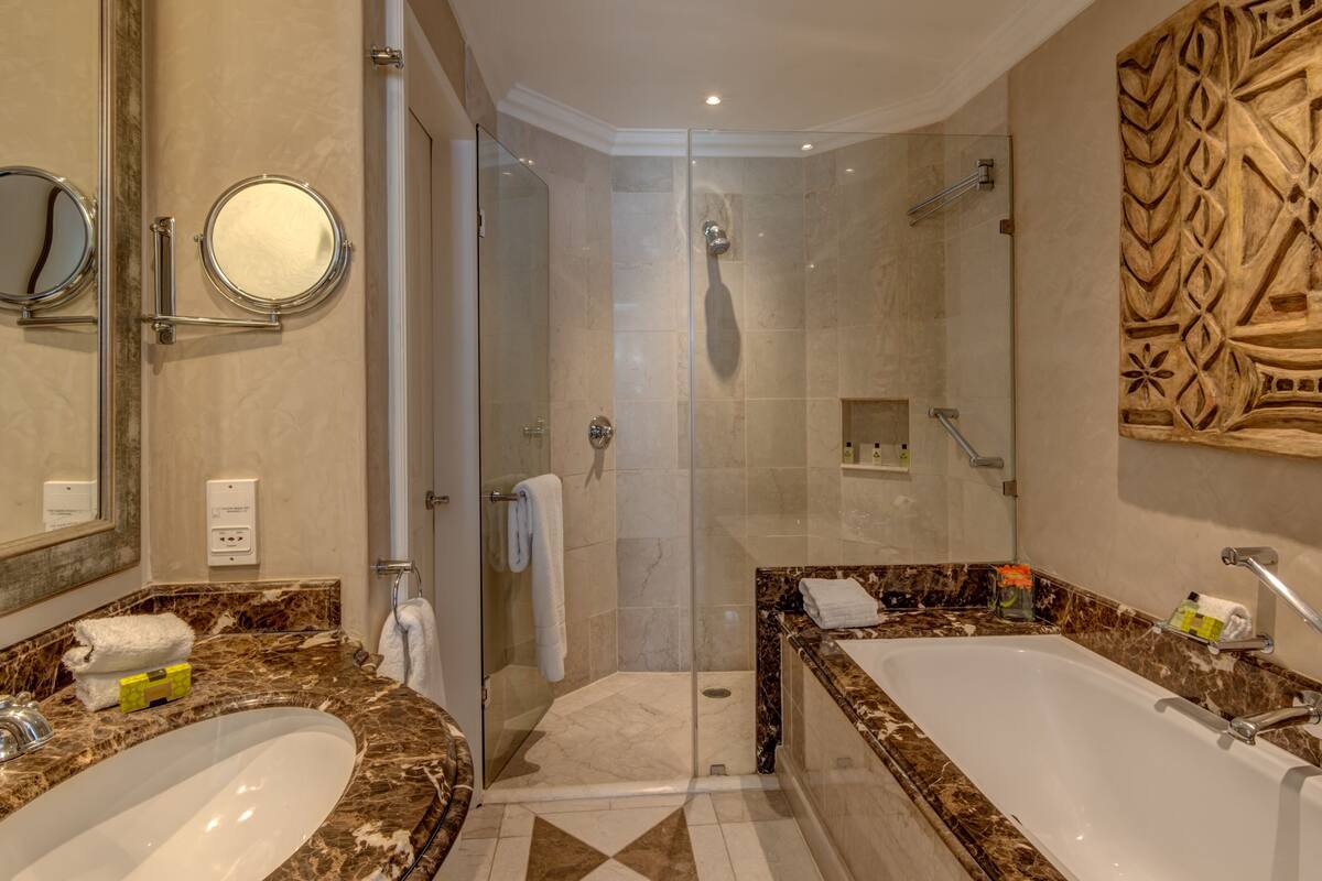 separate bathtub and shower, deep-soaking bathtub, free toiletries