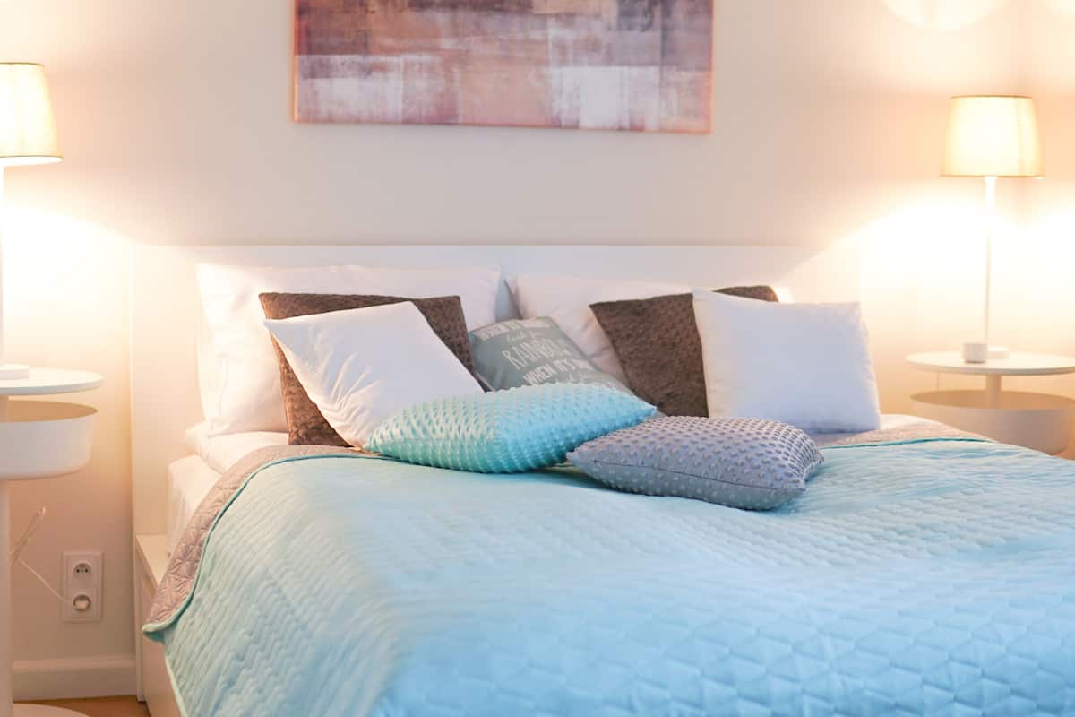 City Apartment | Hypo-allergenic bedding available, laptop workspace, iron/ironing board