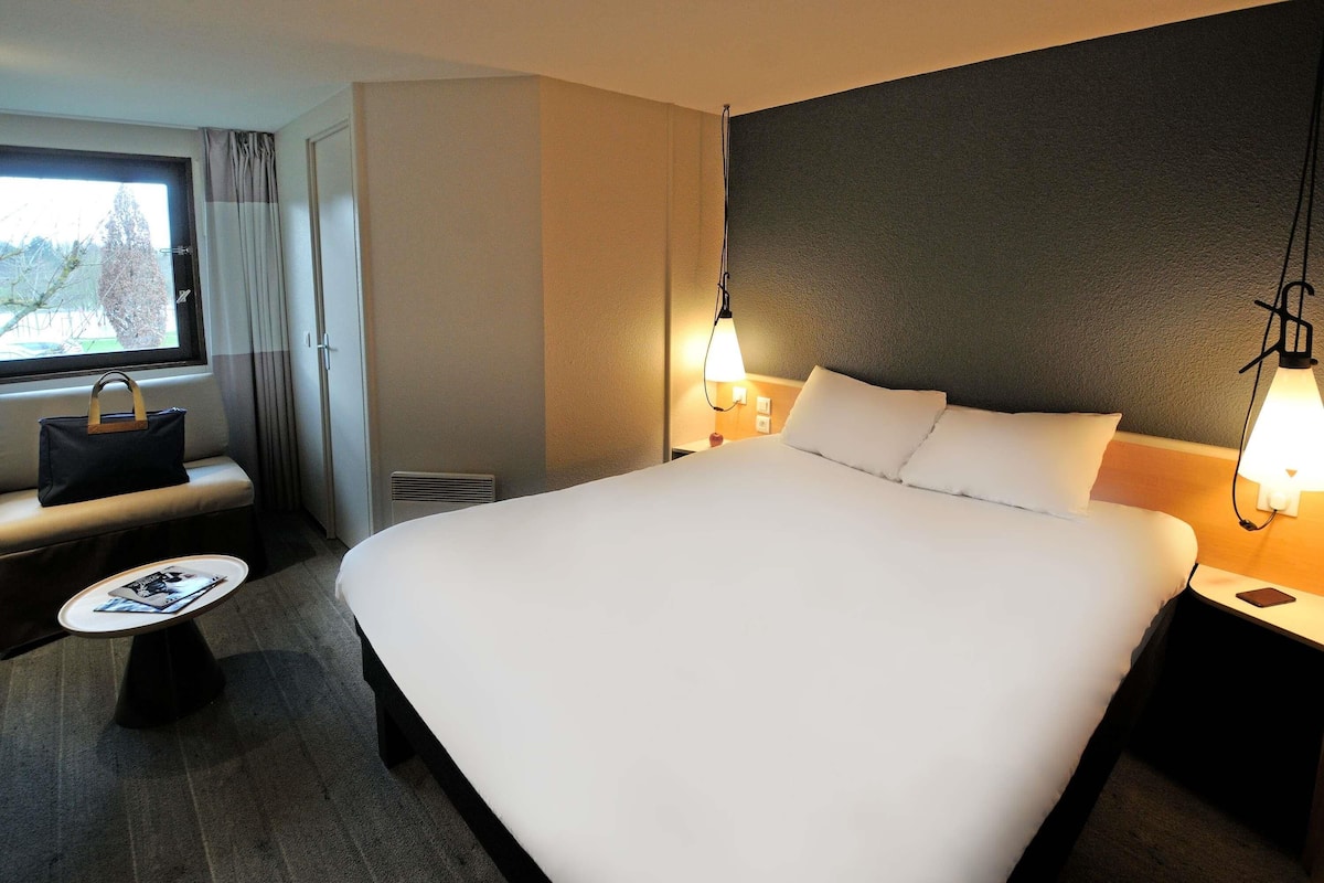 Ropa de cama de alta calidad y cortinas blackout