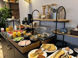 Daily buffet breakfast (EUR 14 per person)