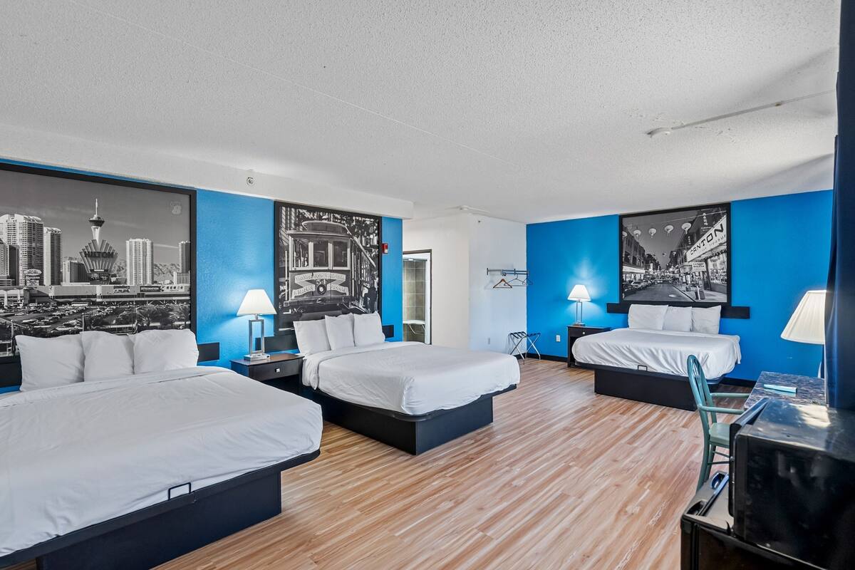 Family Room 3 Queen Beds Oversized Non Smoking  | Desk, laptop workspace, blackout drapes, iron/ironing board