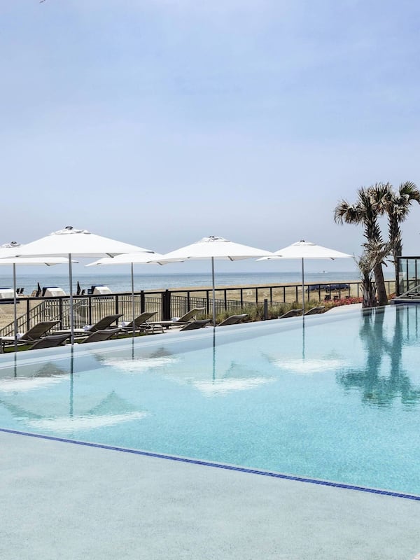Indoor pool, outdoor pool, open 7:00 AM to 11:00 PM, pool umbrellas