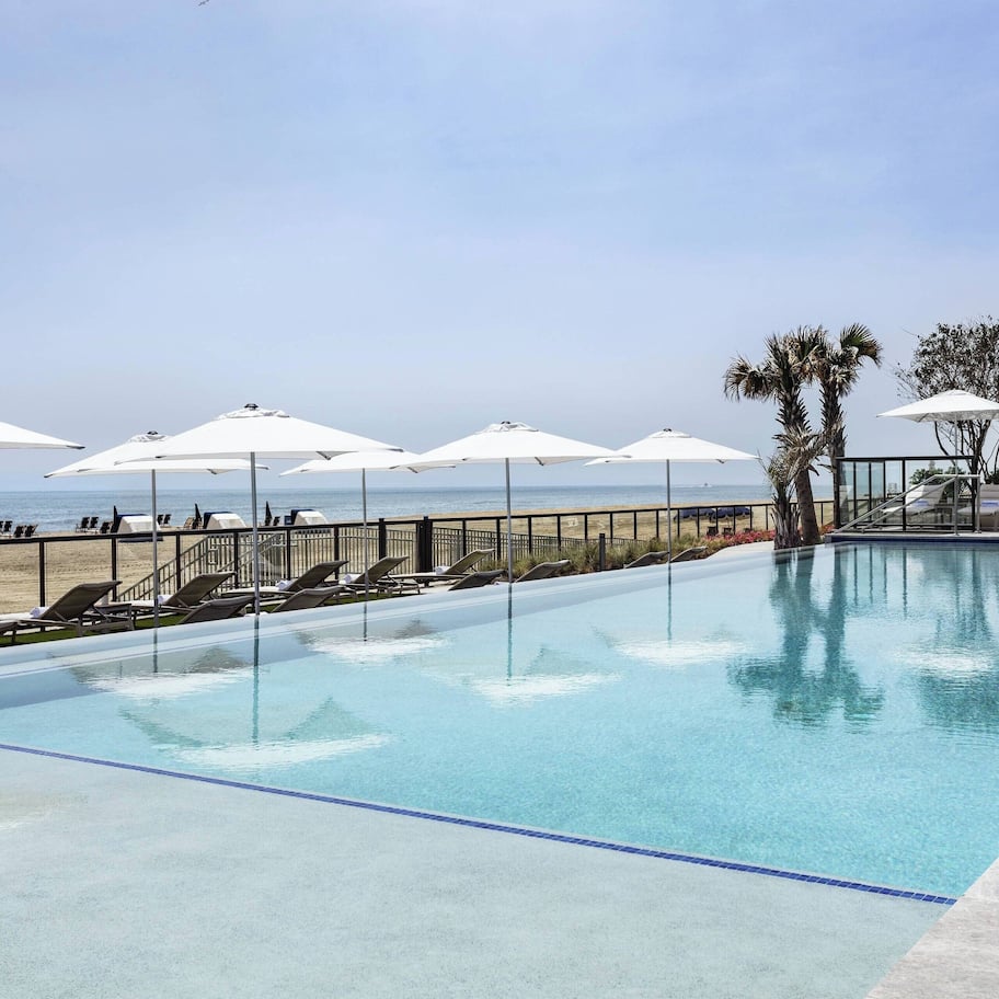 Indoor pool, outdoor pool, open 7:00 AM to 11:00 PM, pool umbrellas