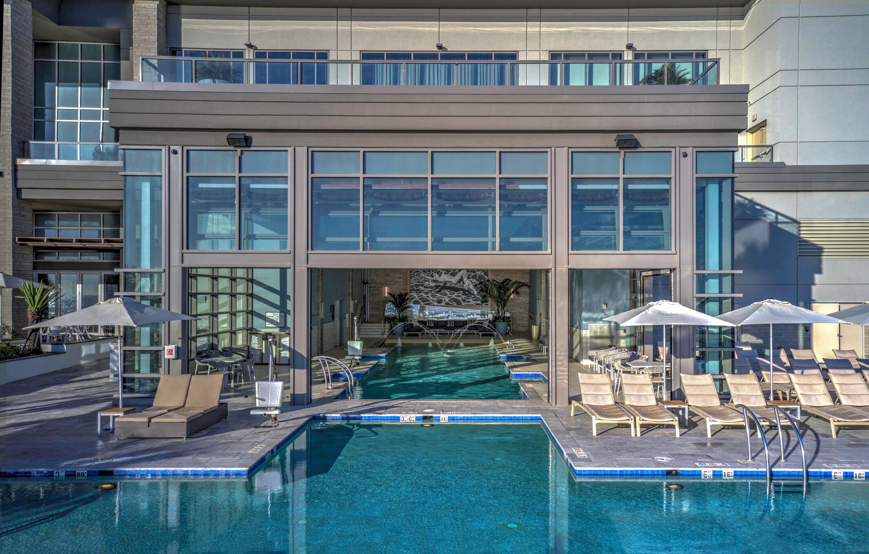 Indoor pool, outdoor pool, open 7:00 AM to 11:00 PM, pool umbrellas