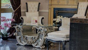 A luxurious lobby with ornate furniture, a glass coffee table, and a fireplace. - The Jephson Hotel, BW Signature Collection (Royal Leamington Spa)