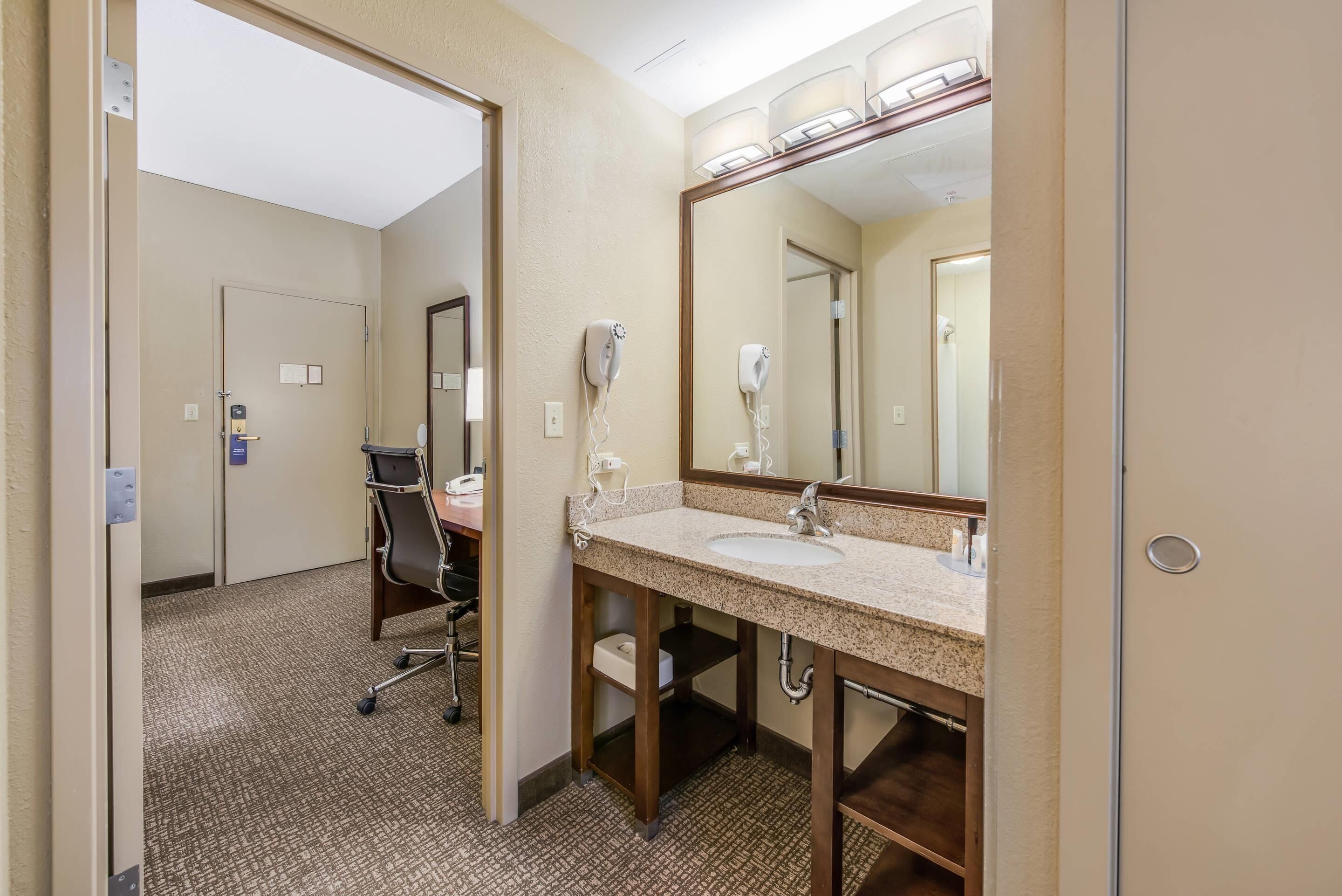 desk, blackout curtains, iron/ironing board, free cots/infant beds