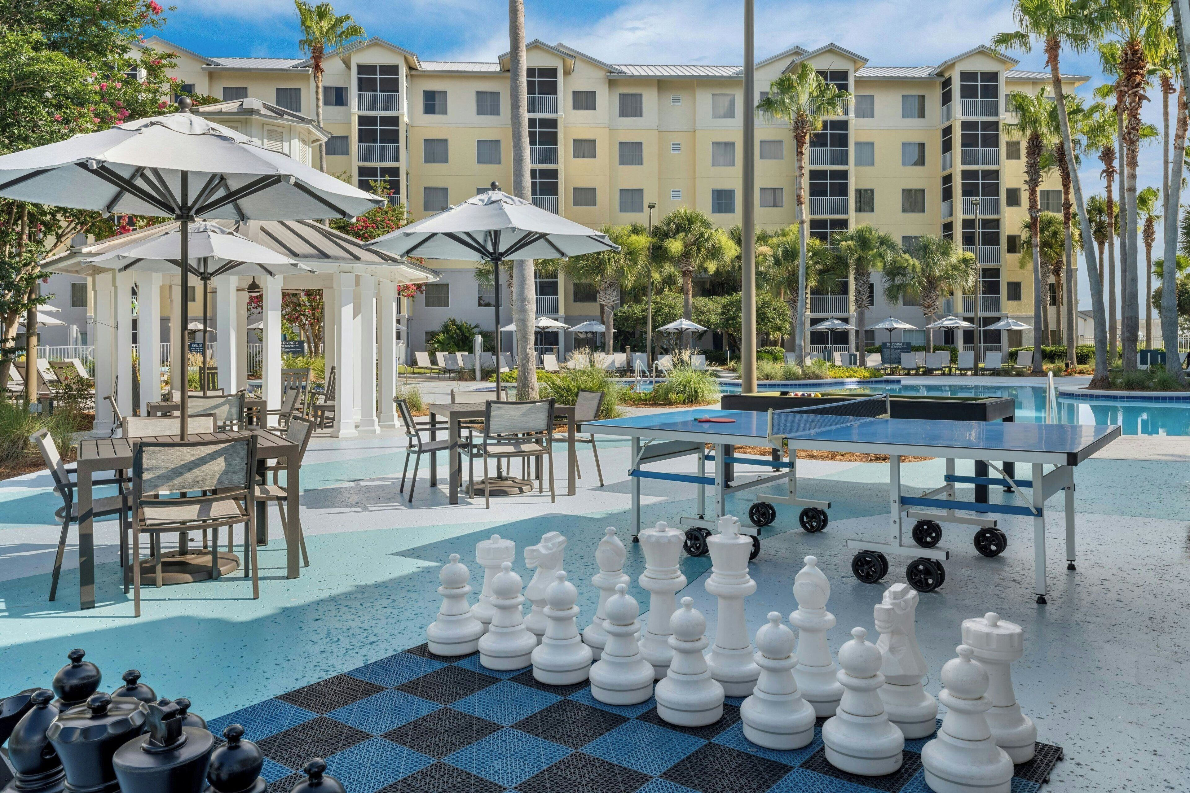 outdoor pool, pool umbrellas, pool loungers