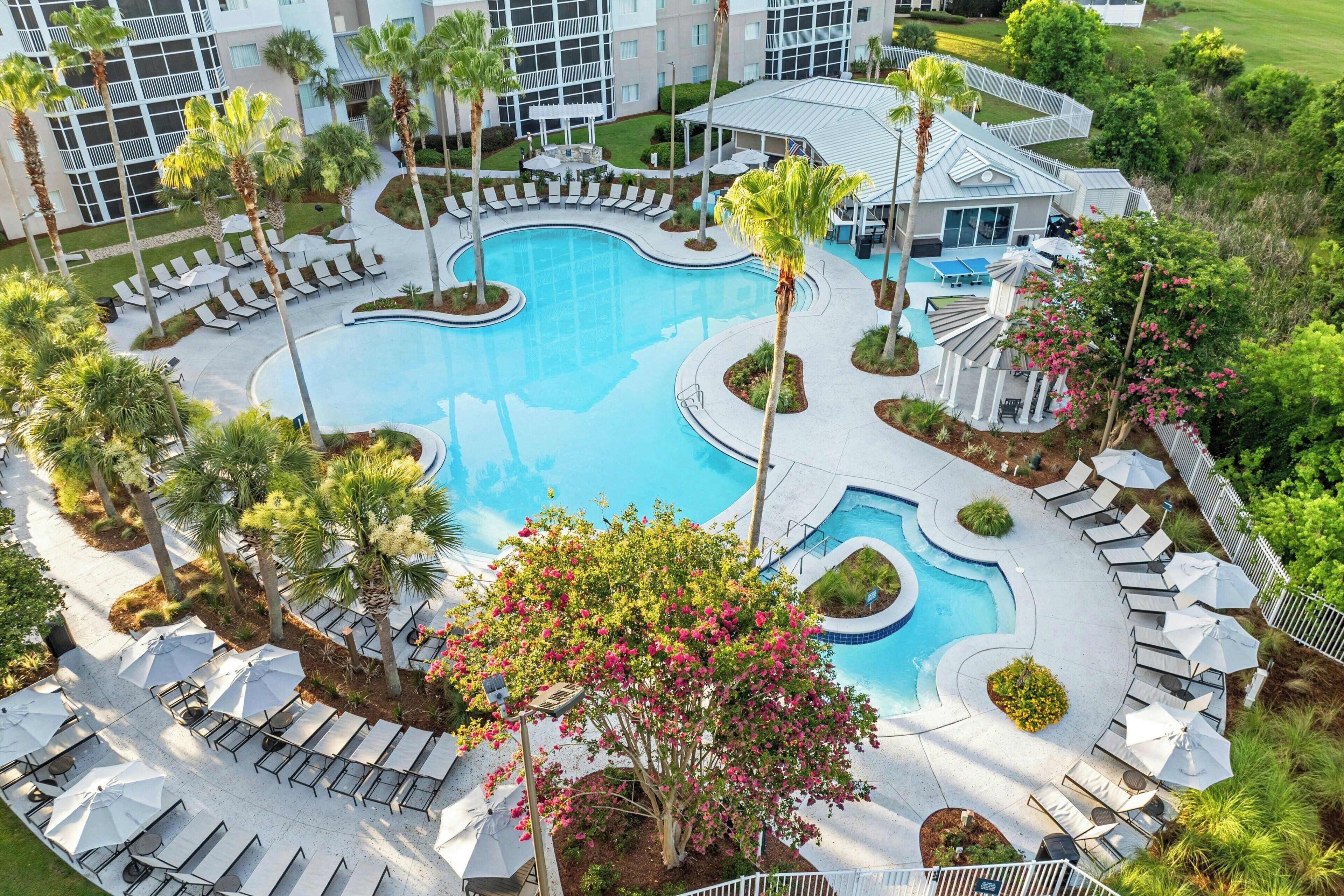 outdoor pool, pool umbrellas, pool loungers