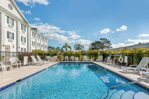 Outdoor pool, open 7:00 AM to 7:00 PM, pool umbrellas, sun loungers