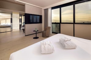 Junior Suite, 1 King Bed | Minibar, in-room safe, individually decorated, desk