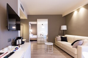 Junior Suite, 1 King Bed (Living Room;with Single Sofabed) | Minibar, in-room safe, individually decorated, desk