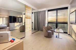 Junior Suite, 1 King Bed | Minibar, in-room safe, individually decorated, desk