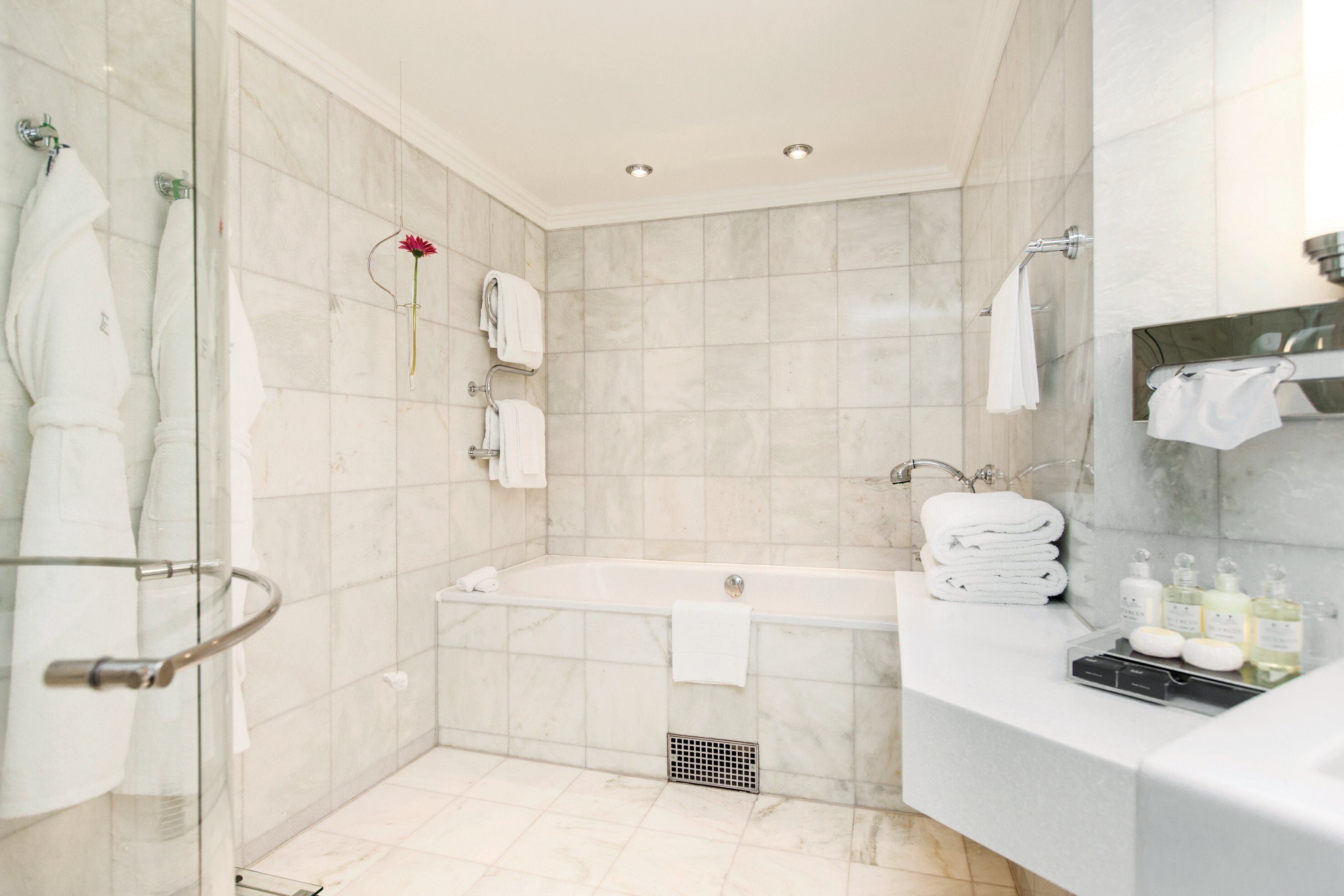 junior suite | bathroom | eco-friendly toiletries, hair dryer, towels