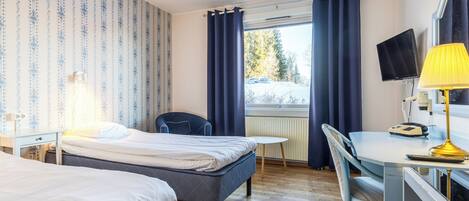 Economy Twin Room, 2 Twin Beds | In-room safe, desk, free WiFi, bed sheets