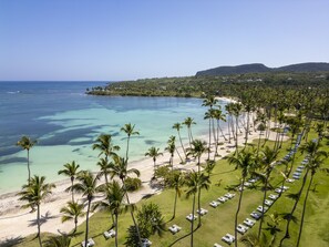 On the beach, sun loungers, beach towels