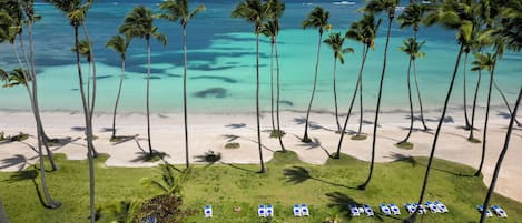 On the beach, sun loungers, beach towels
