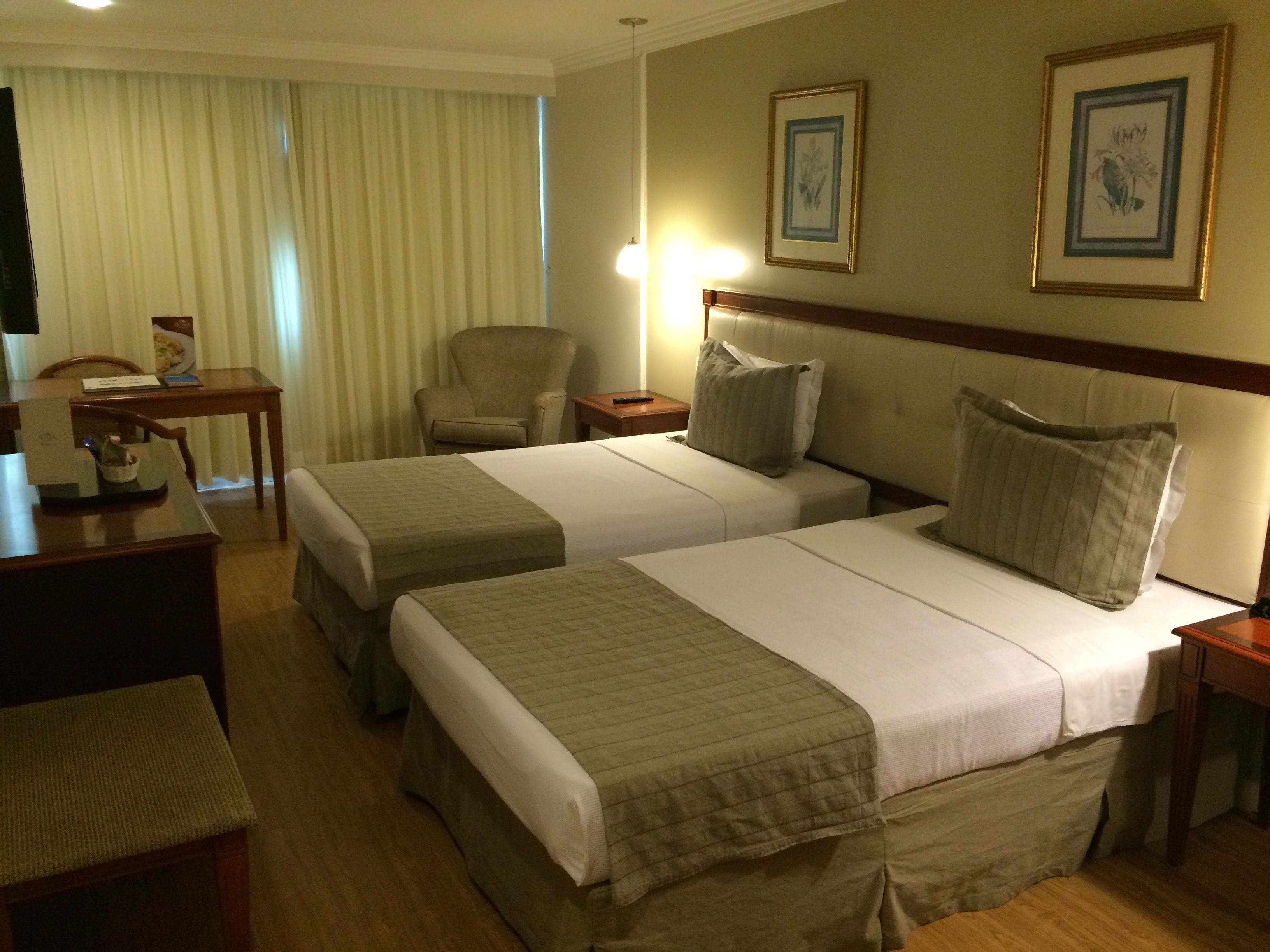 deluxe room, sea view | living area | 40-inch led tv with cable channels, tv