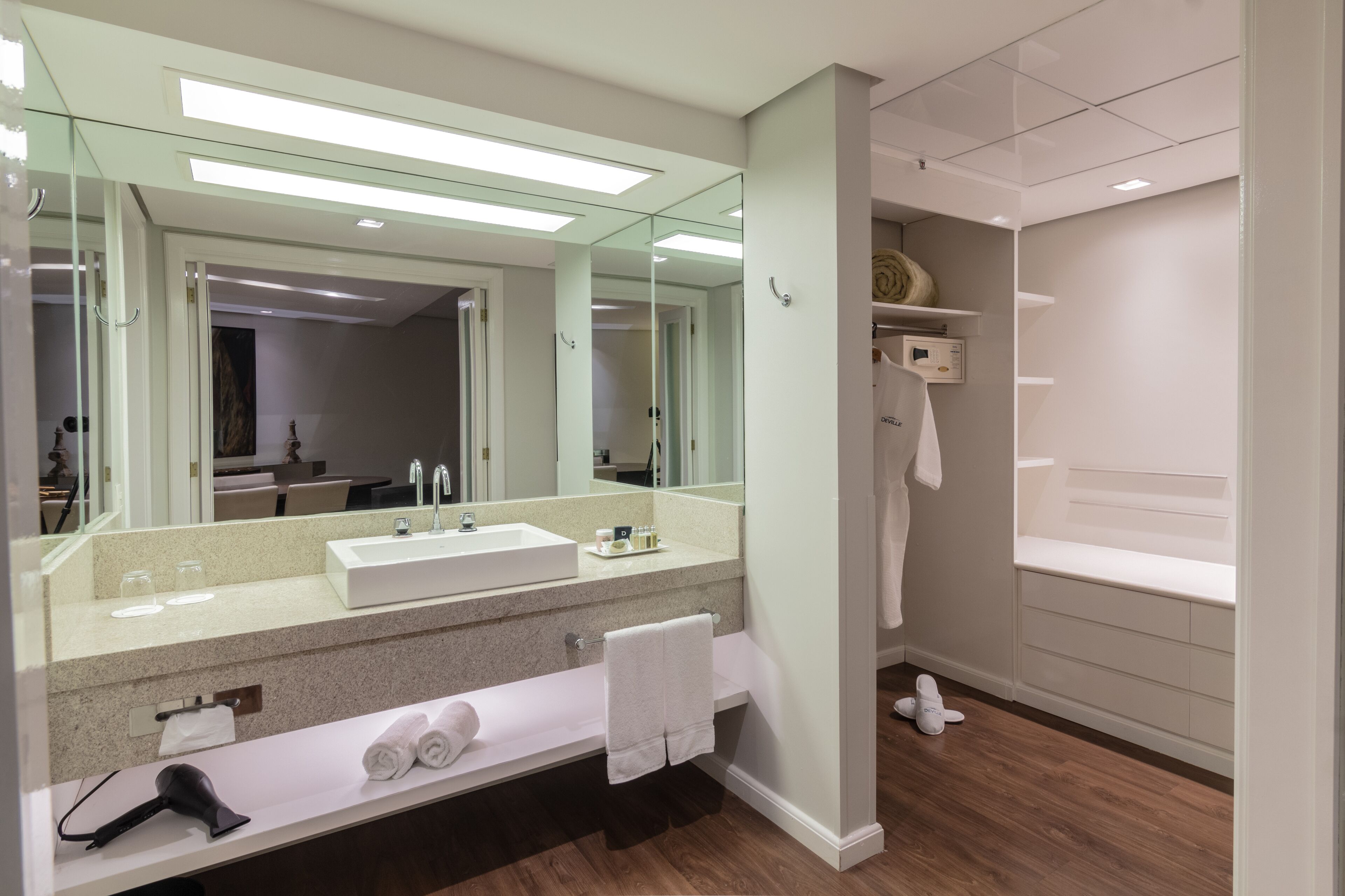 suite | bathroom | shower, hair dryer, towels