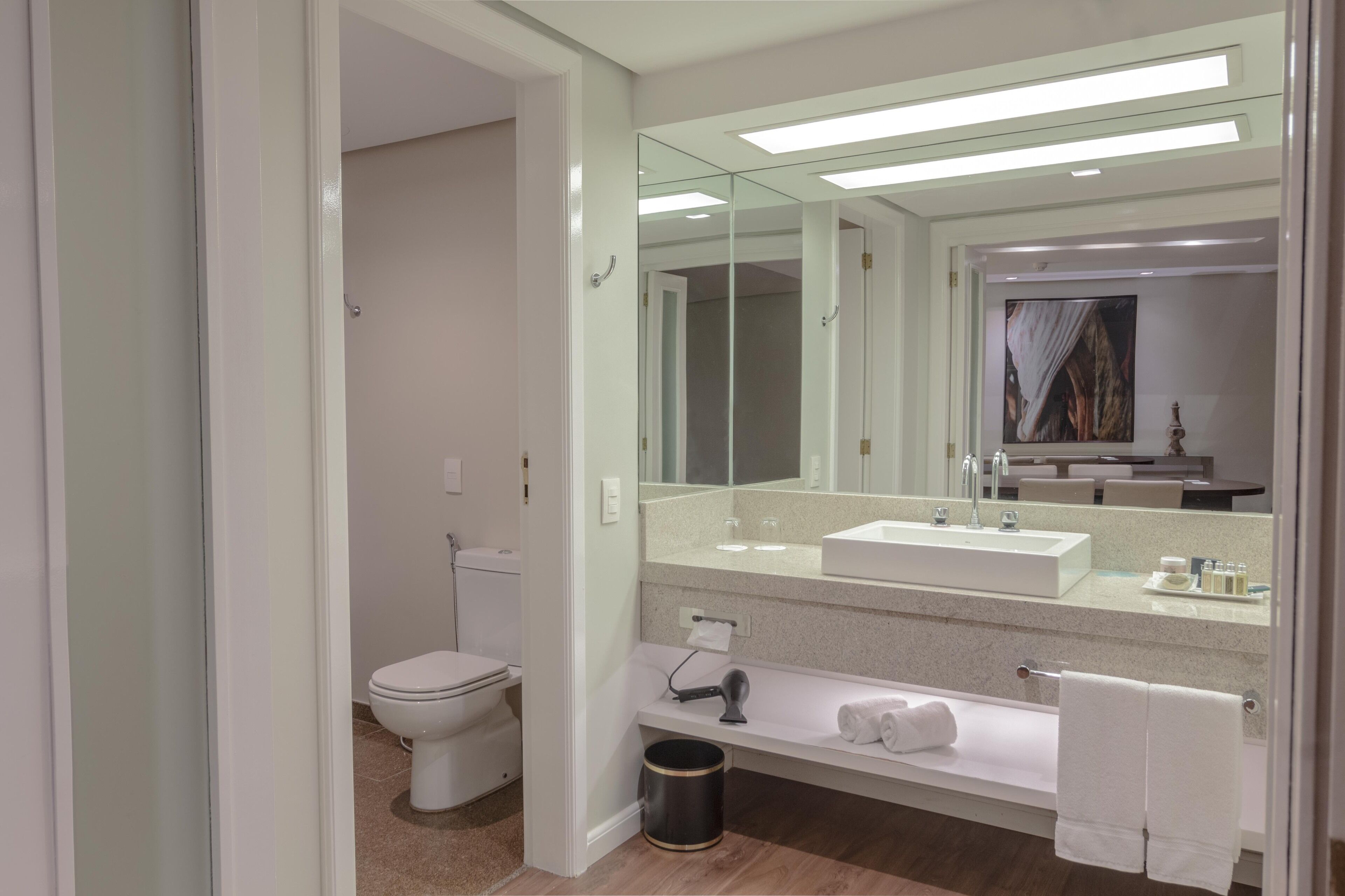 suite | bathroom | shower, hair dryer, towels