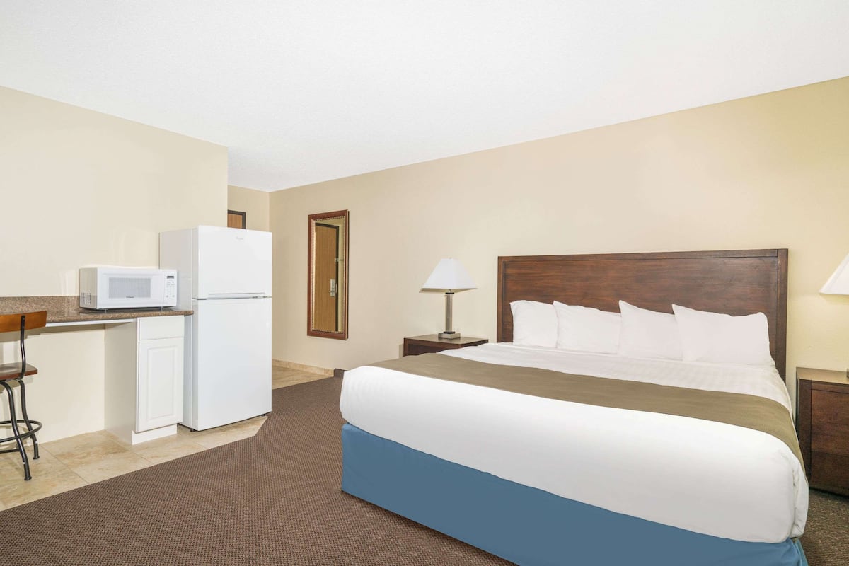 Family Suite, 2 Bedrooms, Non Smoking (1 King Bed & 1 Double Bed) | Desk, laptop workspace, blackout drapes, soundproofing