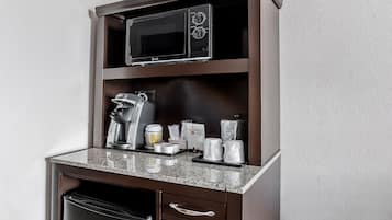 Premium bedding, desk, laptop workspace, blackout curtains