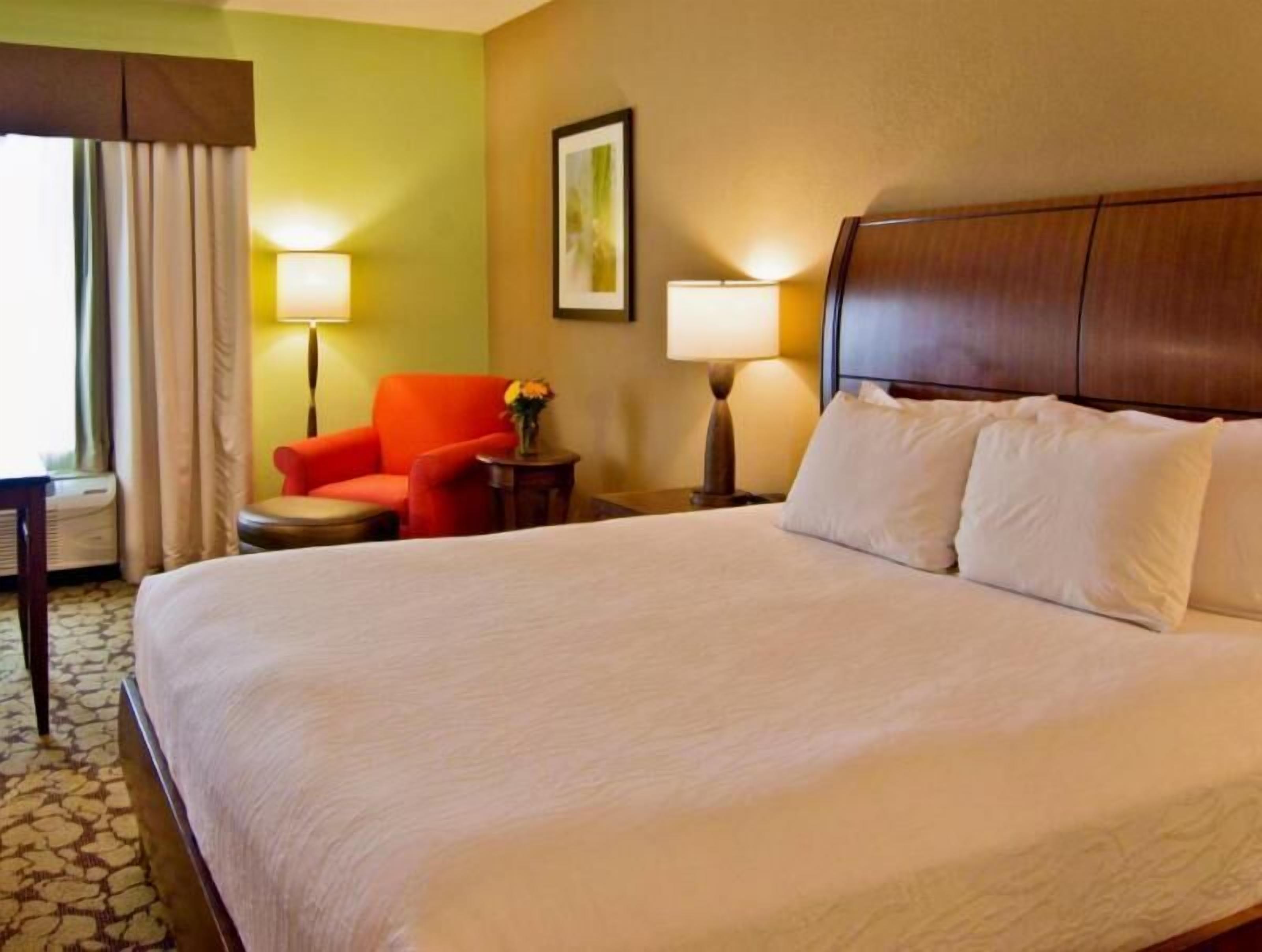 Desk, laptop workspace, blackout drapes, iron/ironing board