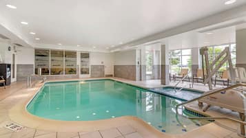 Indoor pool, open 6:00 AM to 10:00 PM, pool loungers