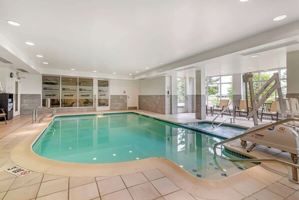 Indoor pool, open 6:00 AM to 10:00 PM, pool loungers