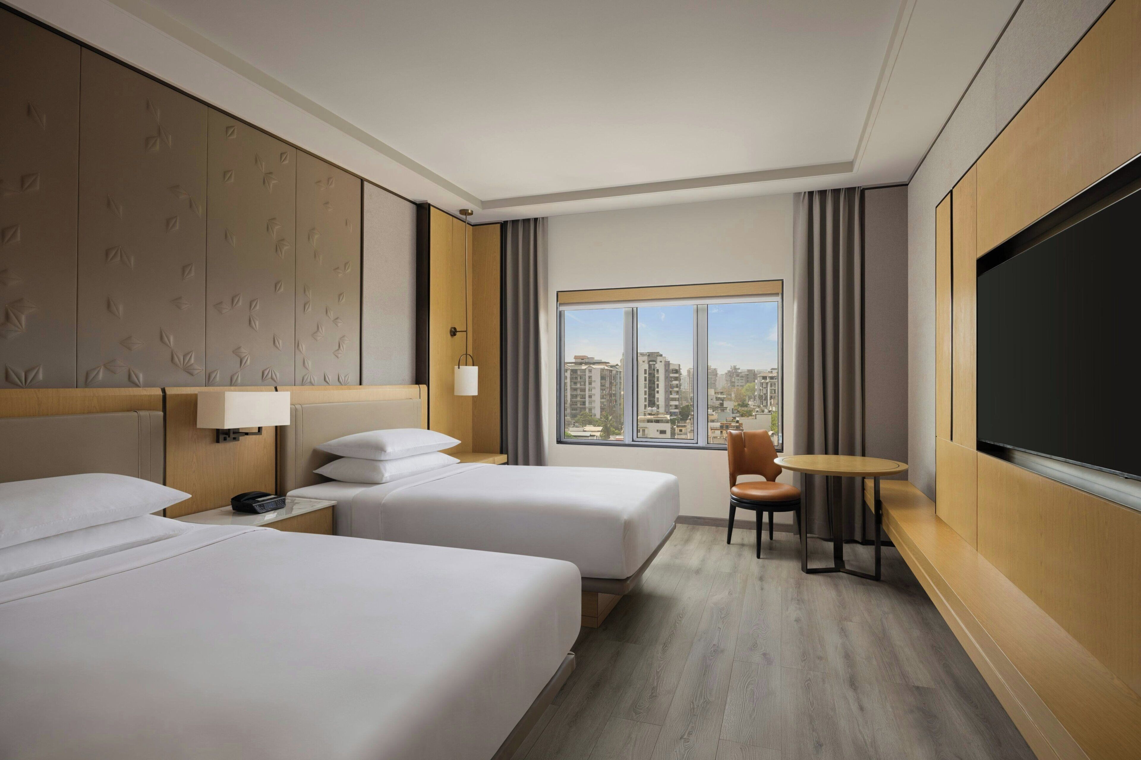 Deluxe Room, 2 Queen Beds, City View | Free minibar items, in-room safe, desk, laptop workspace