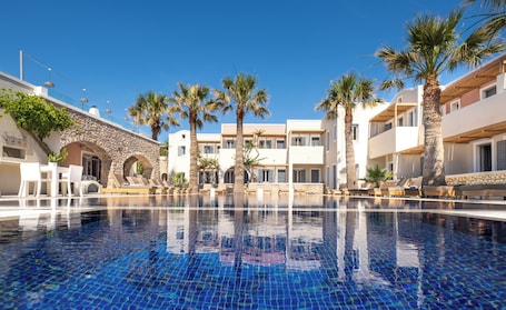 Seasonal outdoor pool, pool umbrellas, pool loungers