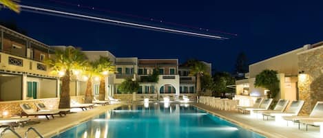 Seasonal outdoor pool, pool umbrellas, pool loungers
