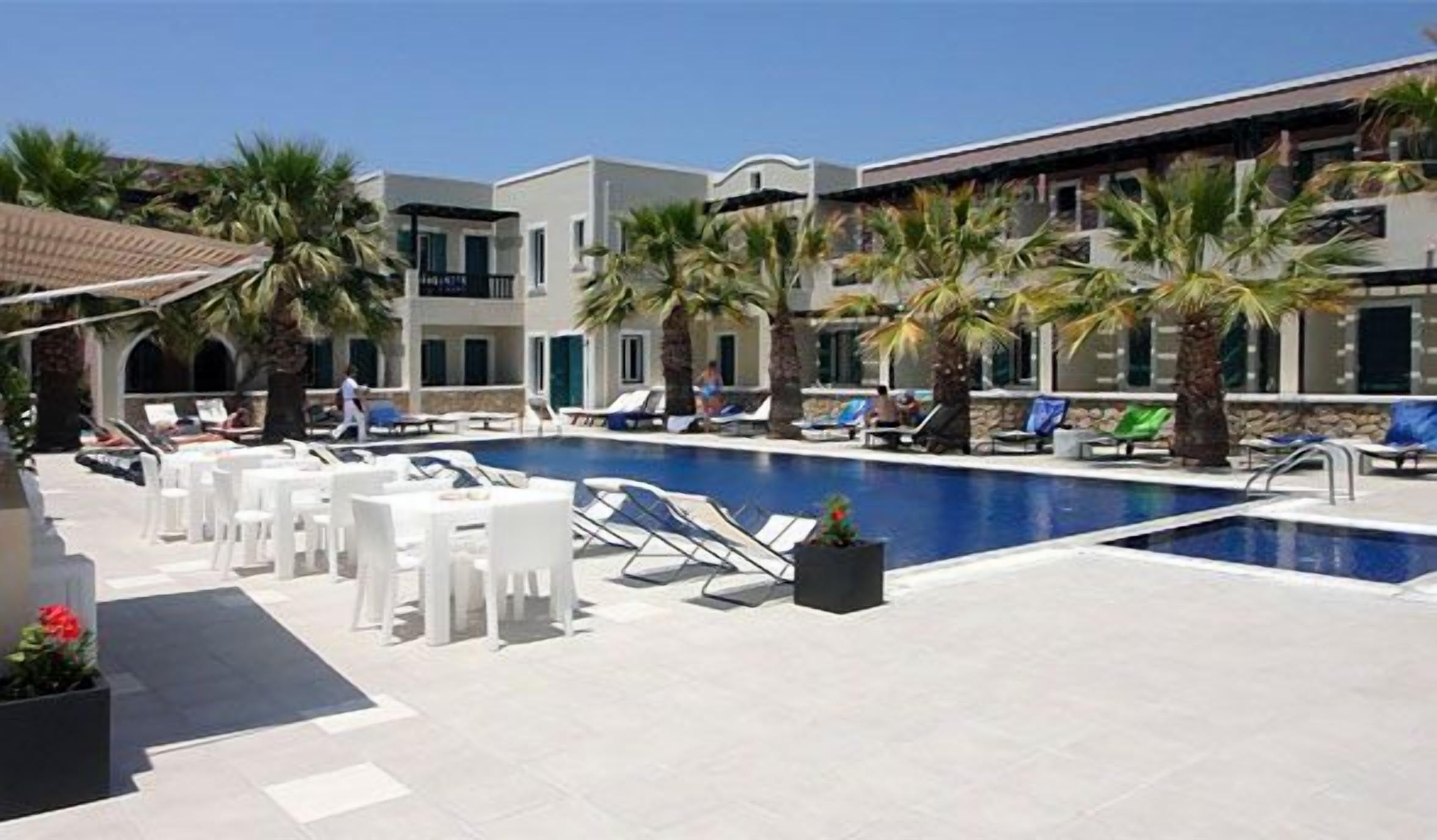 seasonal outdoor pool, pool umbrellas, pool loungers