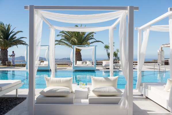 2 outdoor pools, pool umbrellas, sun loungers