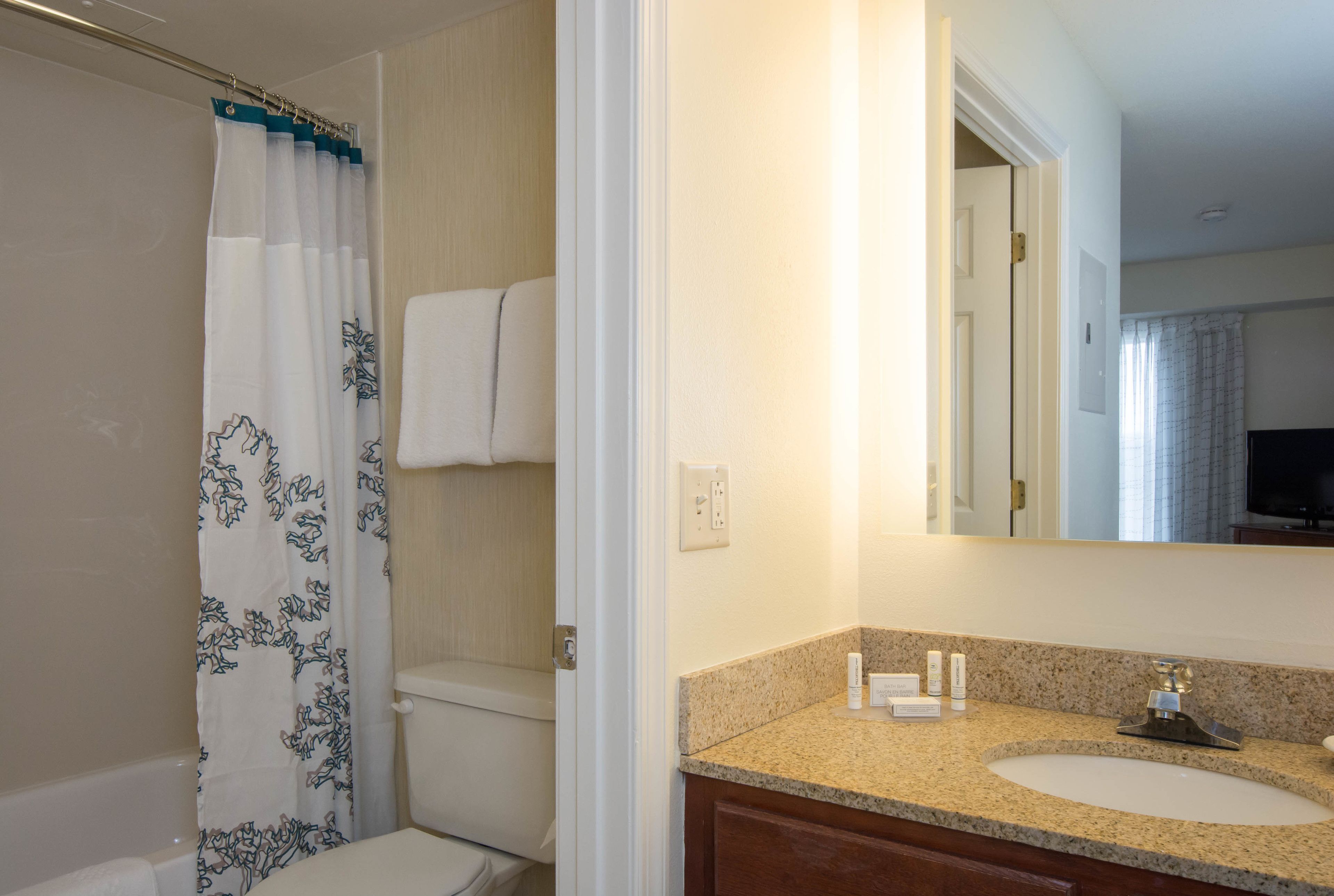 combined shower/bathtub, free toiletries, hair dryer, towels