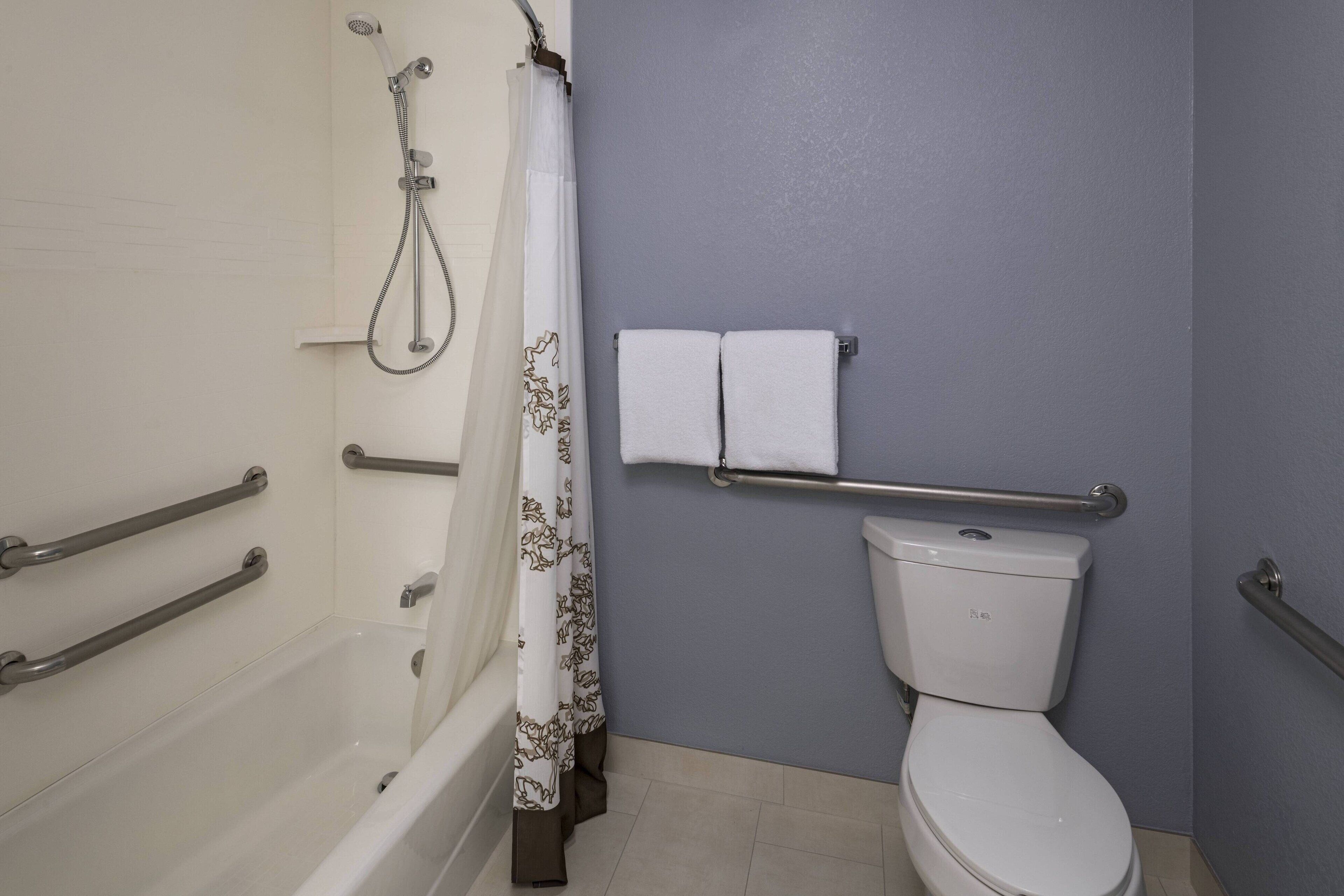 combined shower/bathtub, free toiletries, hair dryer, towels