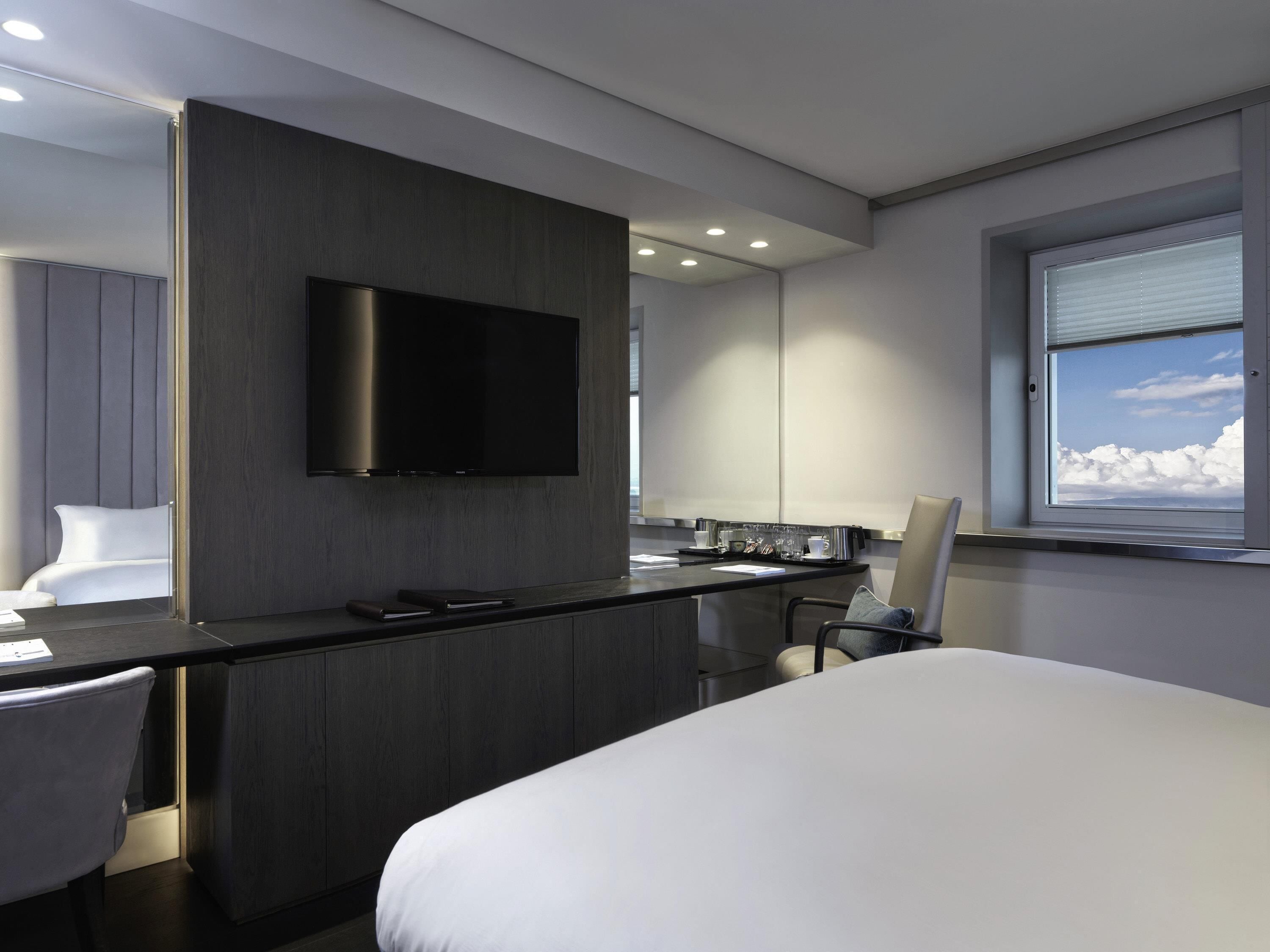 Premium bedding, memory-foam beds, in-room safe, desk