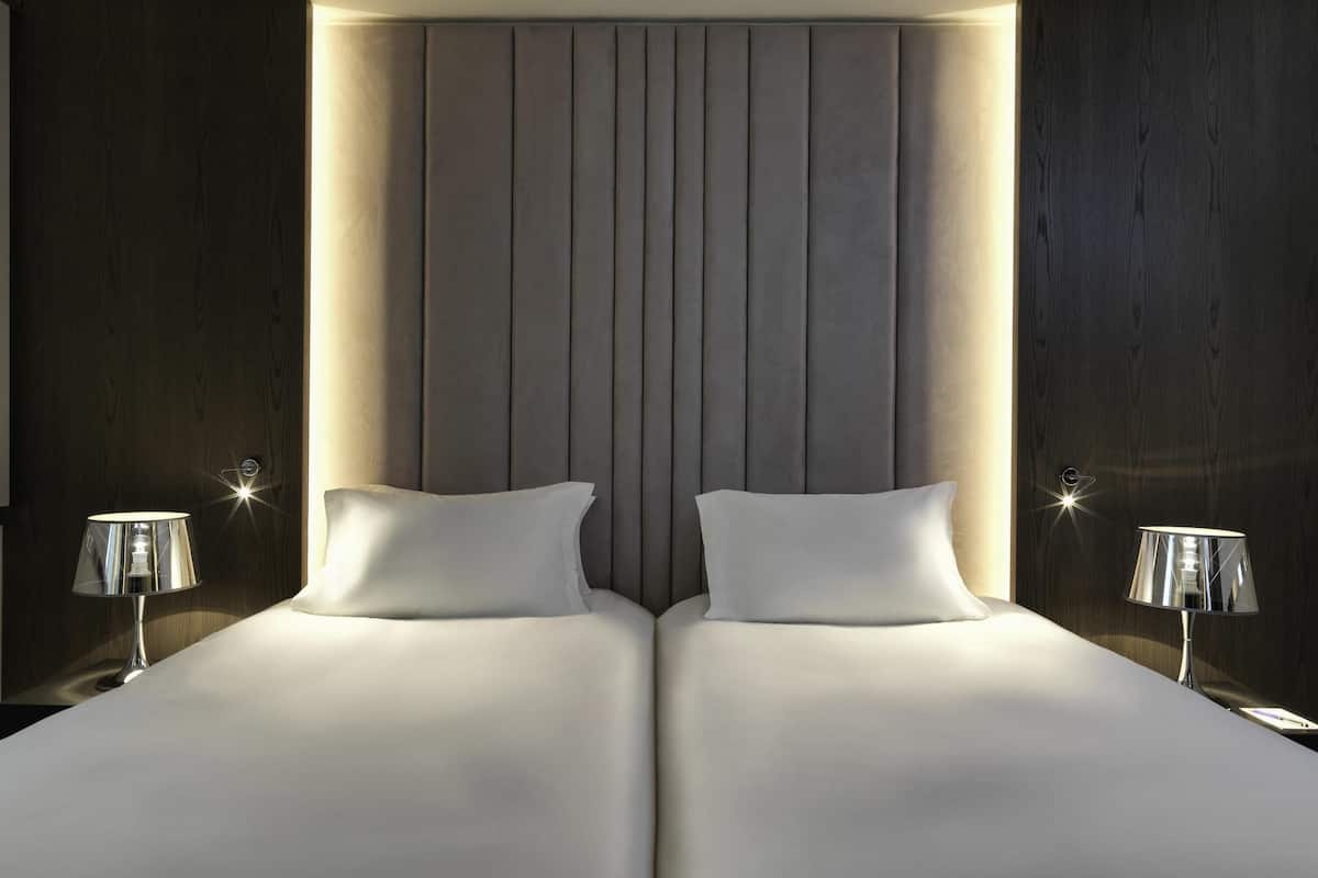 premium bedding, memory-foam beds, in-room safe, desk