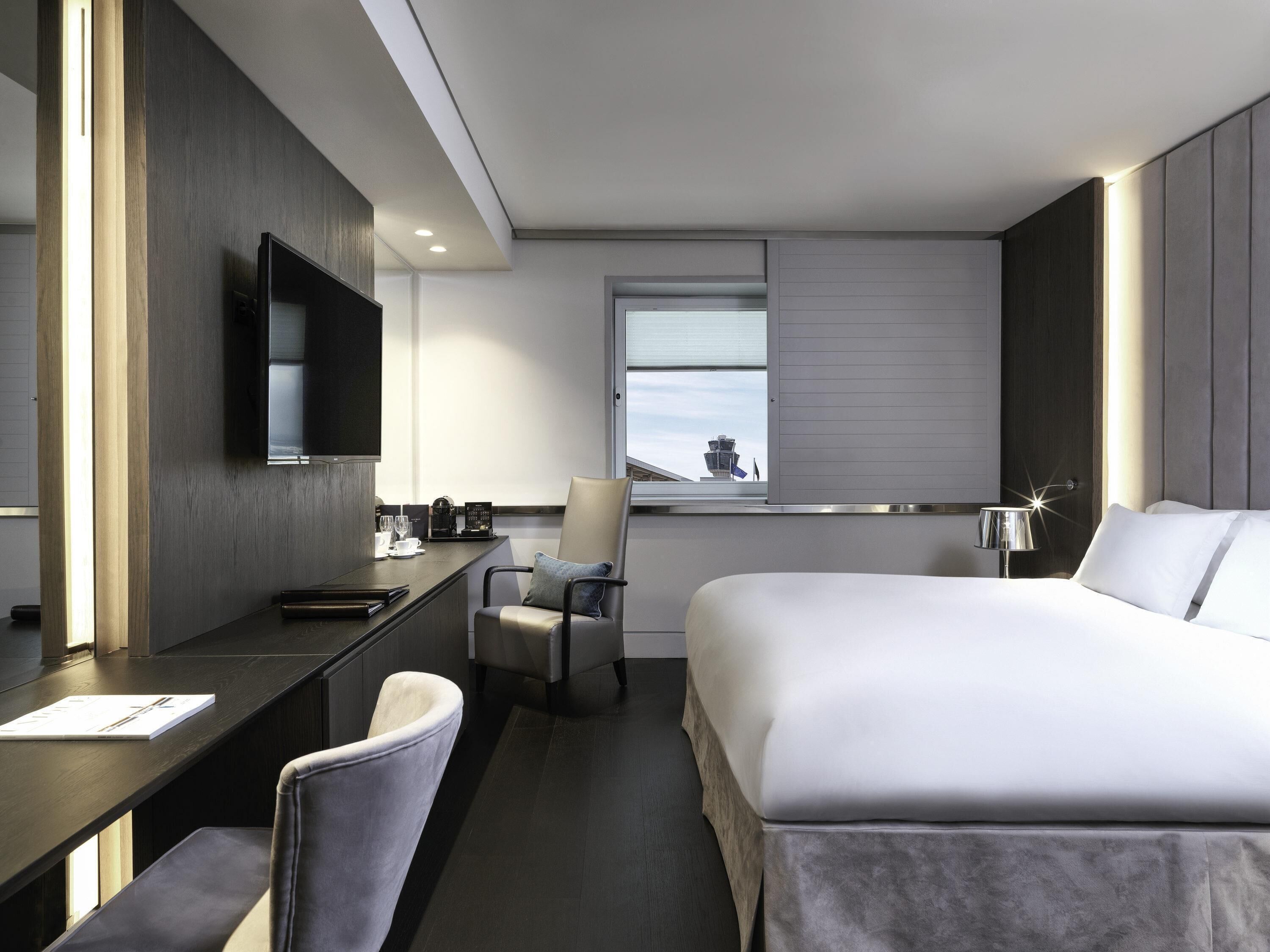 Premium bedding, memory-foam beds, in-room safe, desk