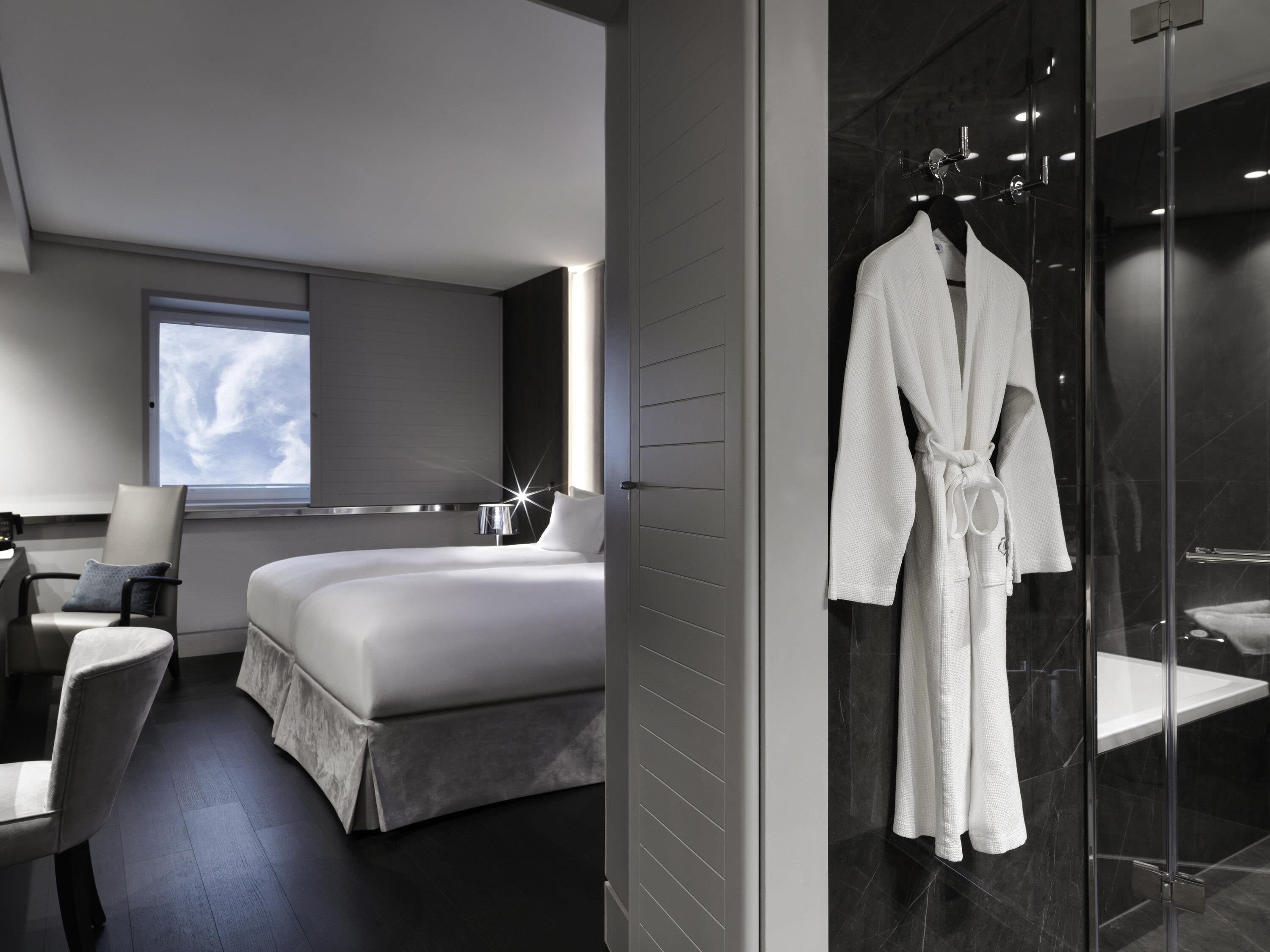 Premium bedding, memory foam beds, in-room safe, desk