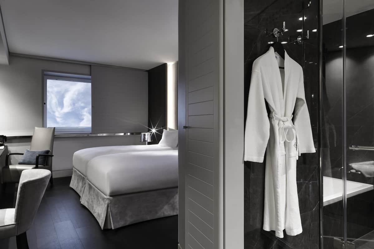 Premium bedding, memory foam beds, in-room safe, desk