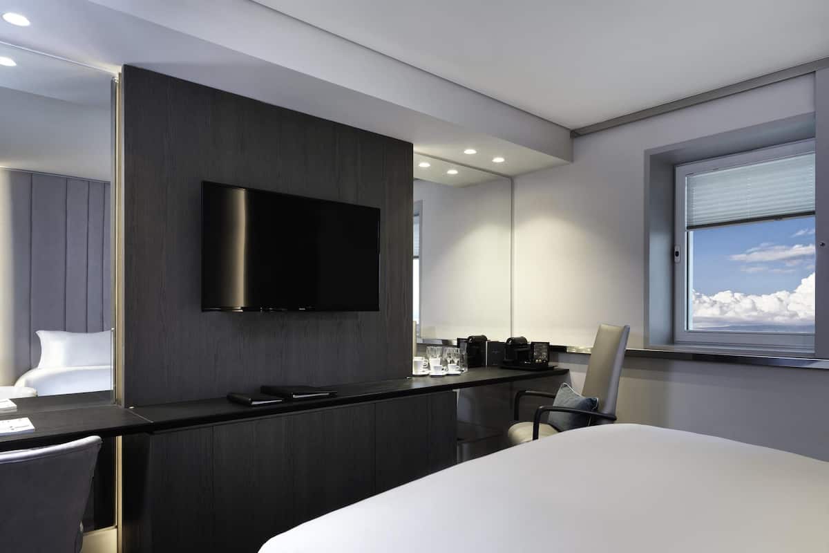 Premium bedding, memory foam beds, in-room safe, desk