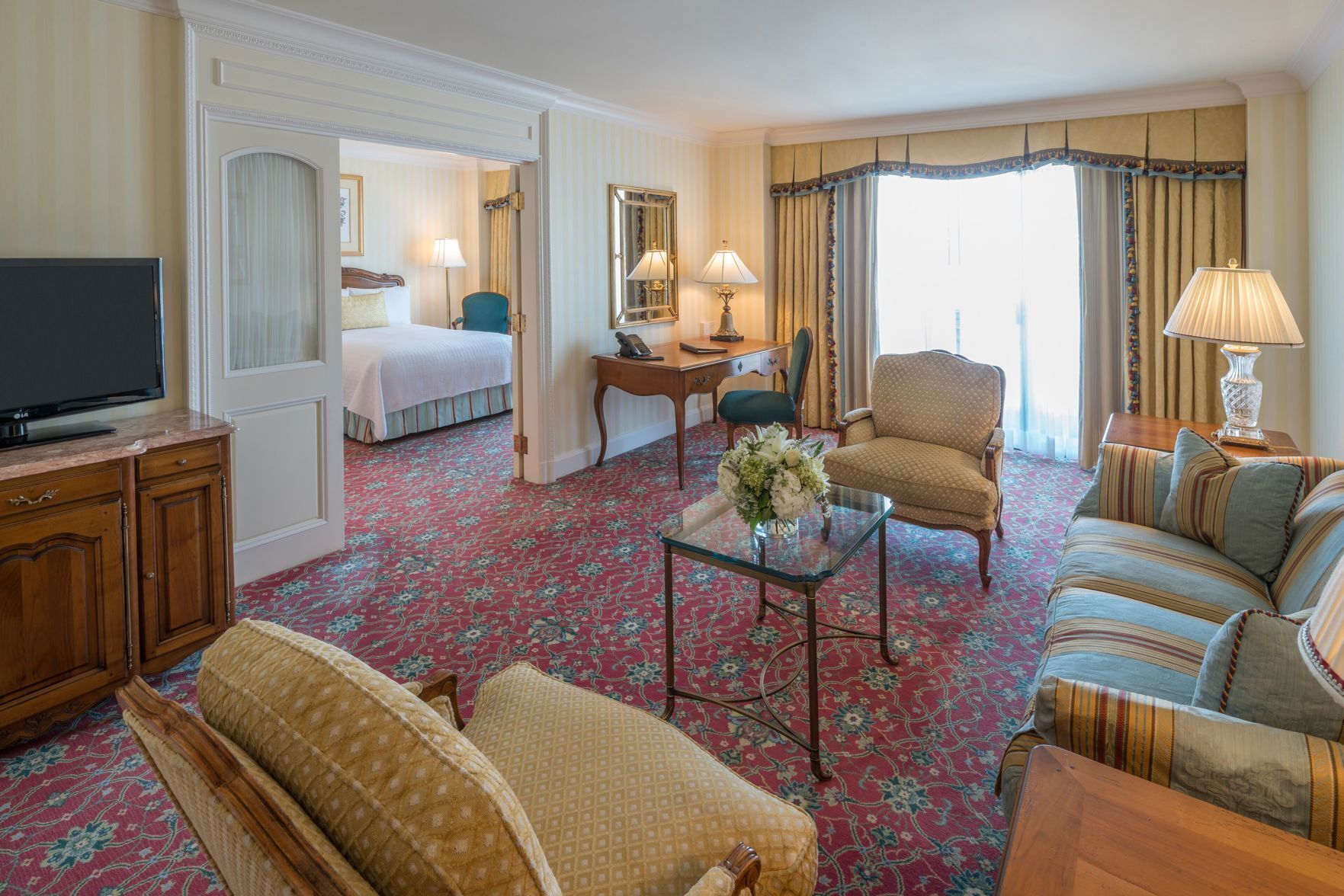 Premium bedding, down comforters, minibar, in-room safe