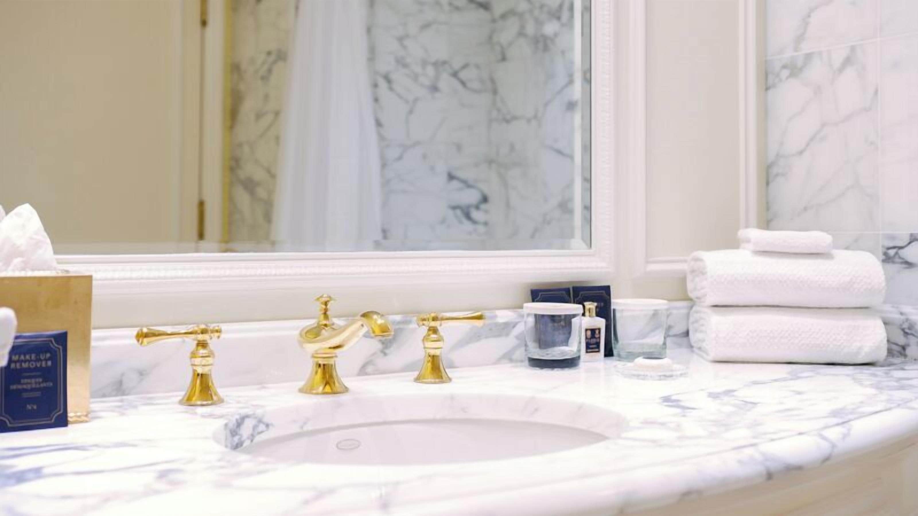 separate bathtub and shower, designer toiletries, hair dryer, bathrobes