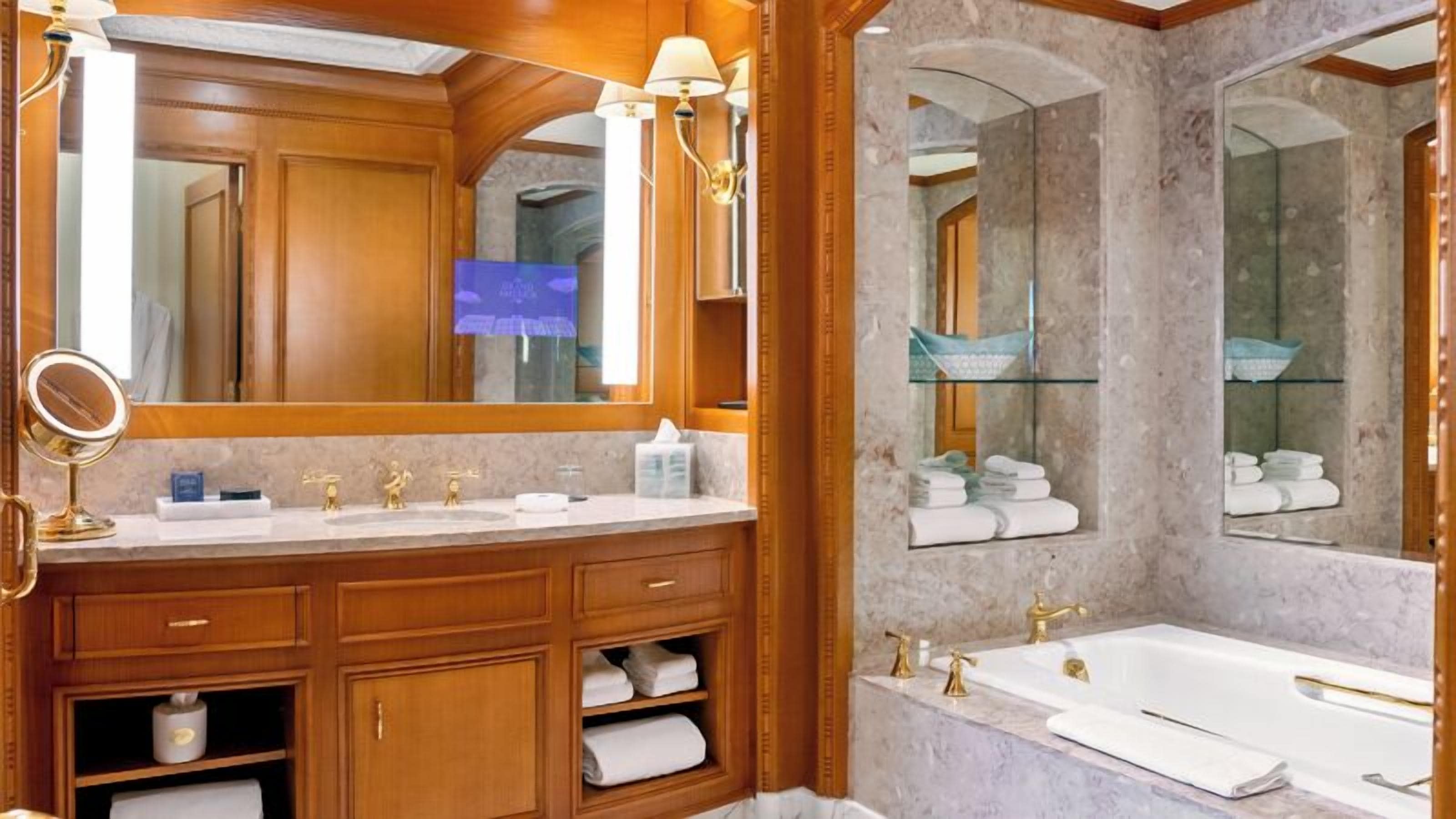 presidential suite | bathroom | separate bathtub and shower, designer toiletries, hair dryer, bathrobes