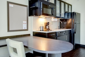 Desk, laptop workspace, blackout curtains, iron/ironing board