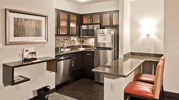 Full-sized fridge, microwave, stovetop, dishwasher
