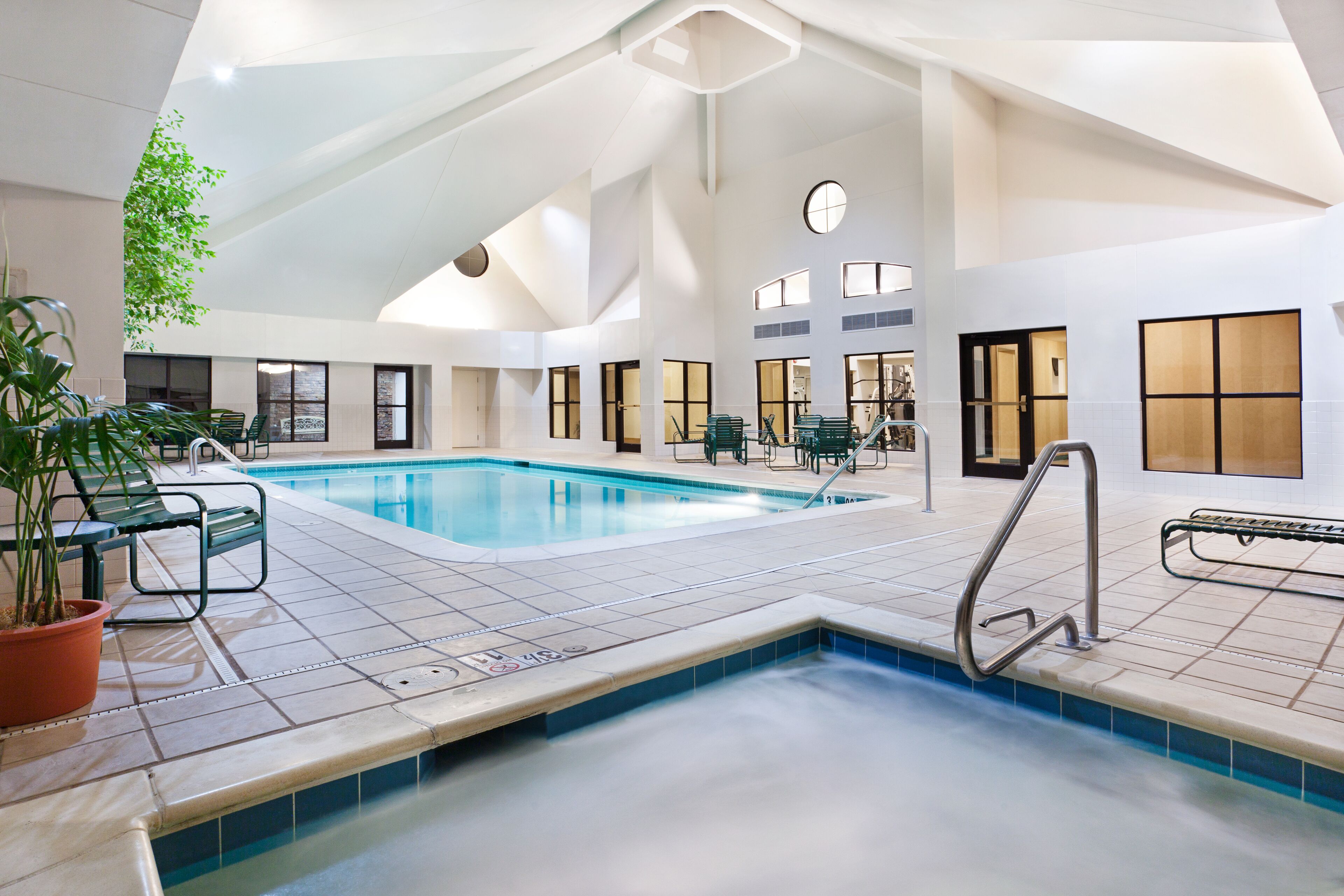 indoor pool, open 8 am to 10 pm, pool loungers