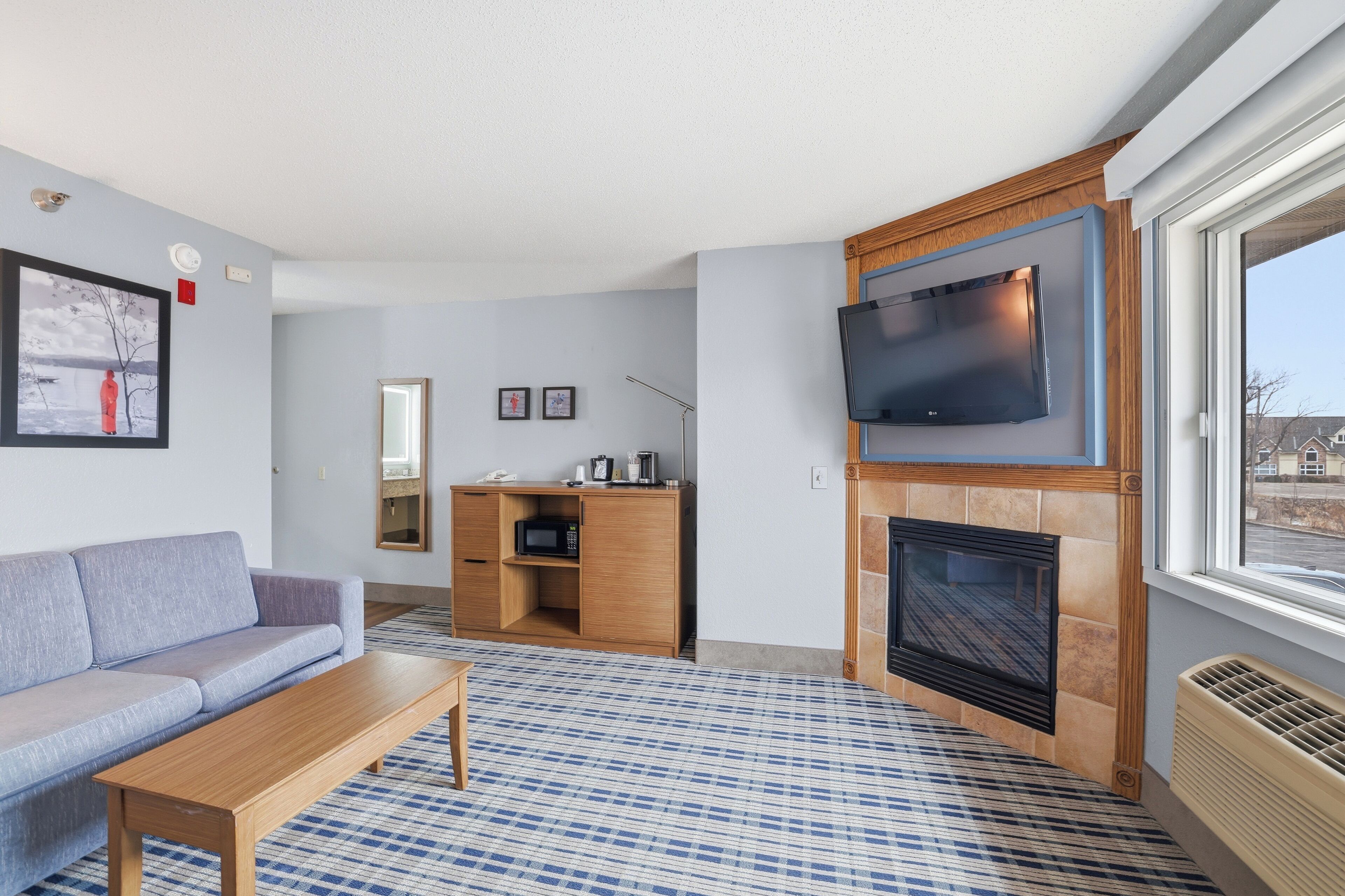 Suite Premier, 1 cama de matrimonio grande, no fumadores | Zona de estar | Una televisión de pantalla plana